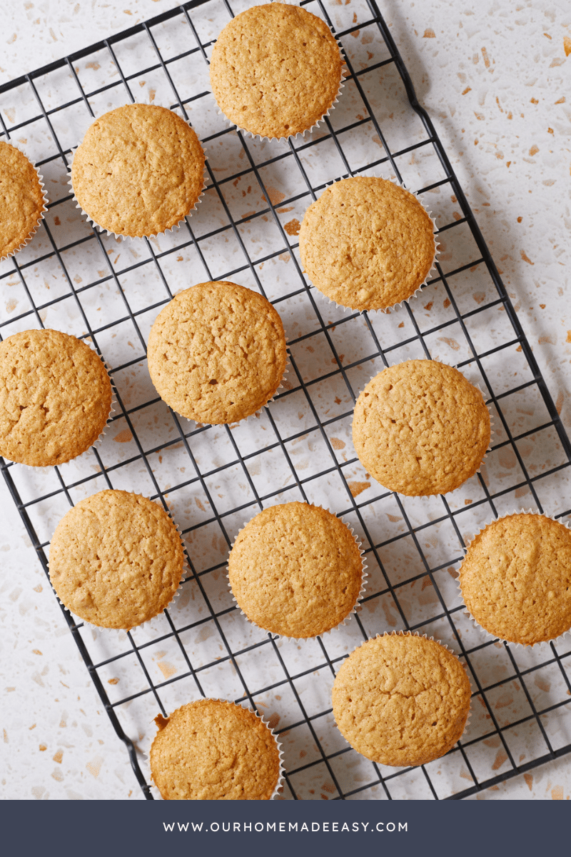 Biscoff cupcakes unfrosted on cooling rack