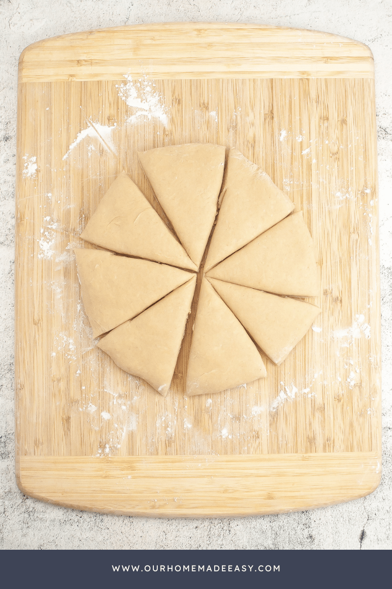 cinnamon scones dough in process on cutting board