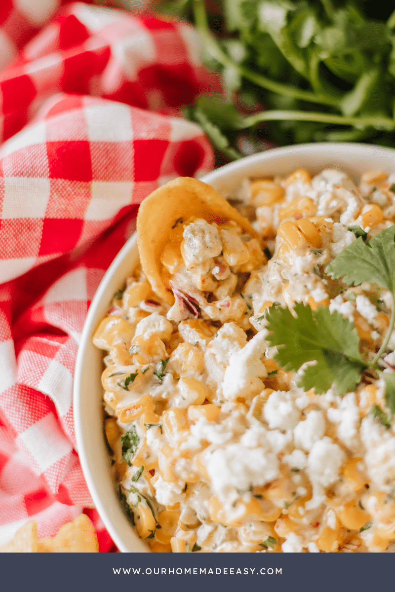 elote dip on wood table