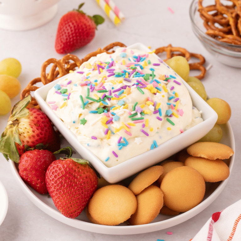 Cake Batter Dip on platter with fruit on table