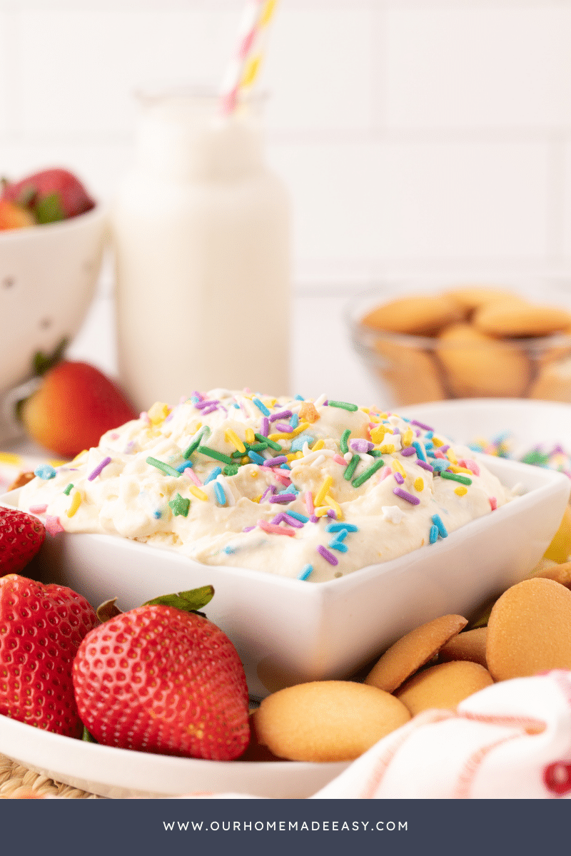 cake batter dip with glass of milk in background