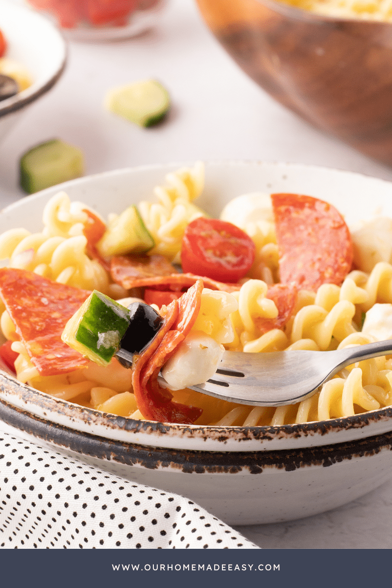 salami pasta salad on fork