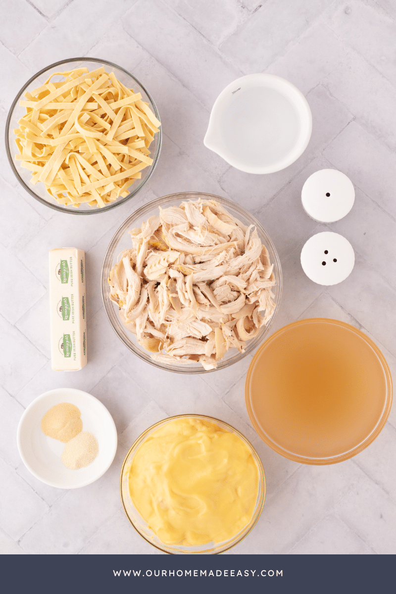 chicken and noodles ingredients arranged on countertop