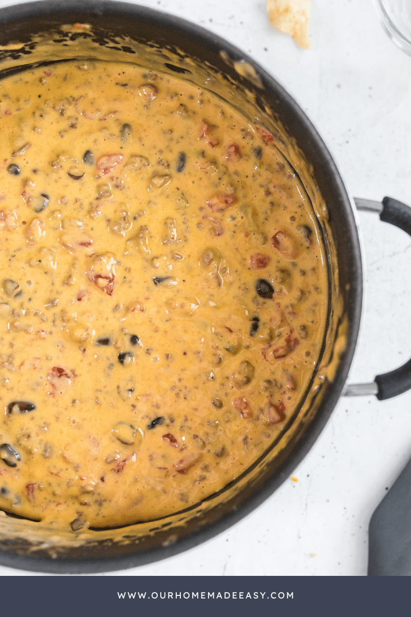 Rotel dip in pan being warmed