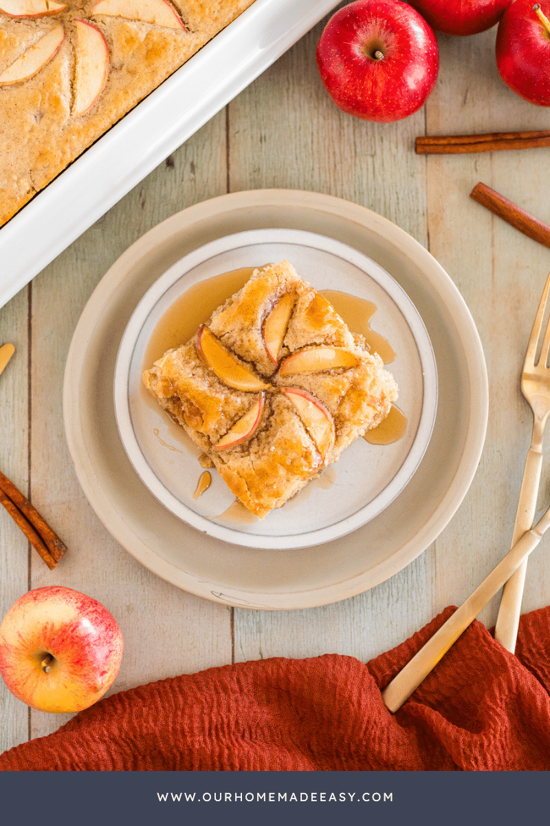 Apple cinnamon sheet pan pancakes on counter and white plate