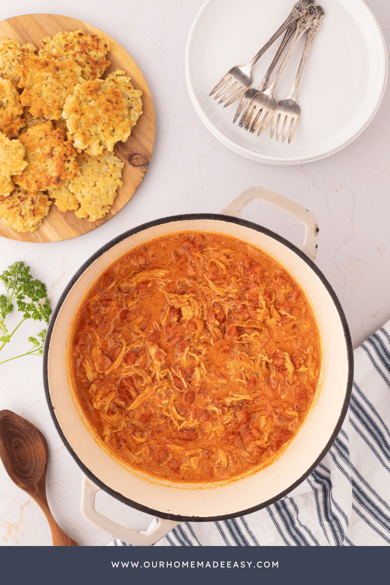 Chicken paprikash recipe on counter top in ceramic pot