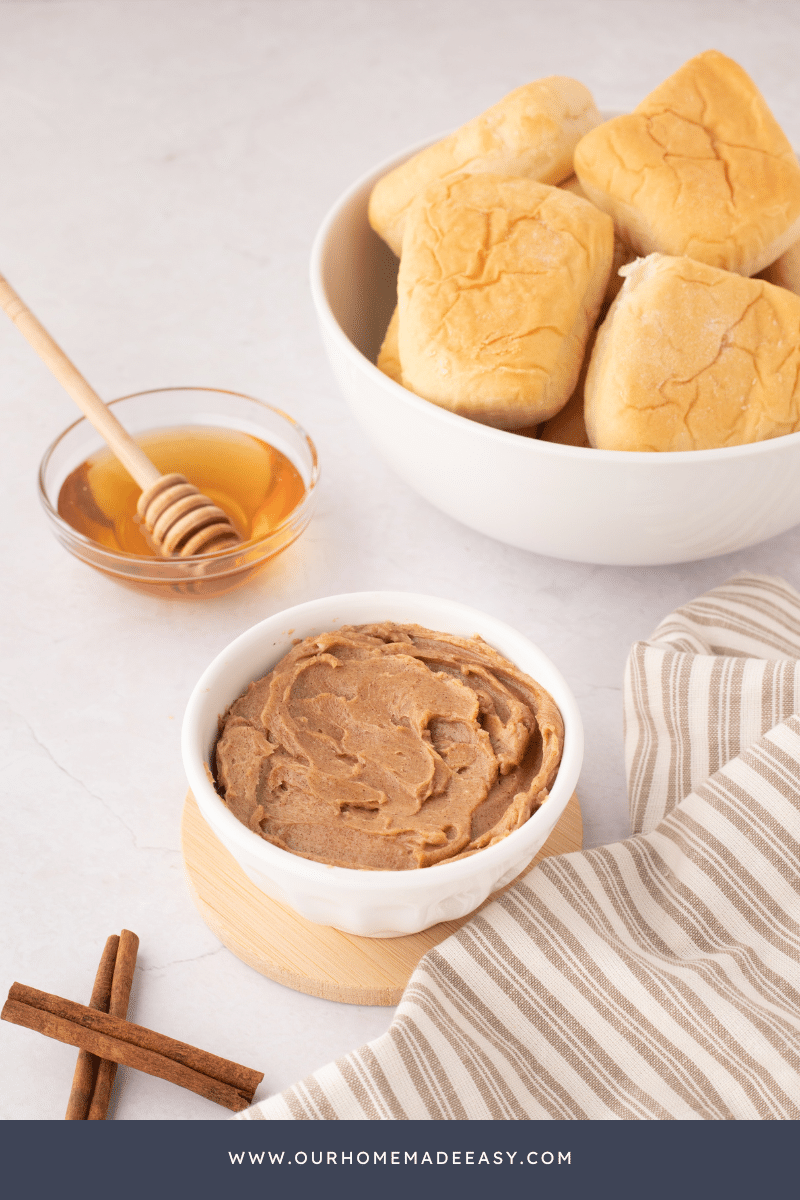 Cinnamon honey butter in crock on counter top