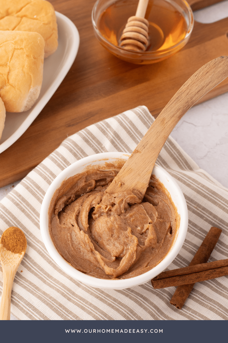 Cinnamon honey butter in crock on counter top