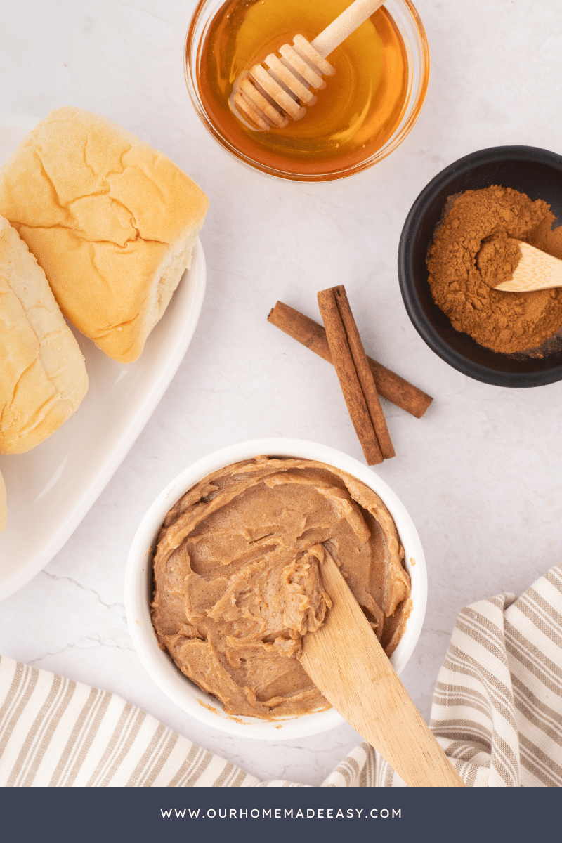 Cinnamon honey butter in crock on counter top