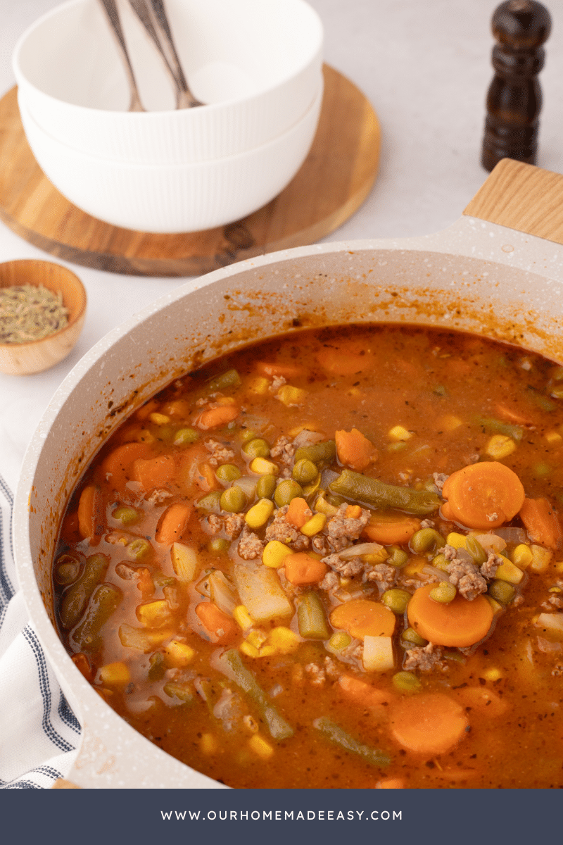 Ground Beef Vegetable Soup in Dutch Oven on CounterTop