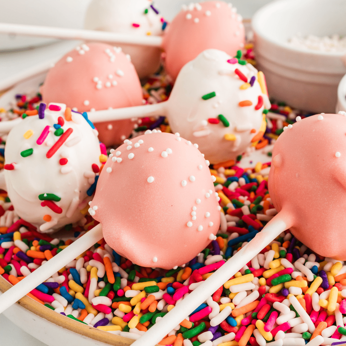 Easy Cake Pop Recipe lying over sprinkles