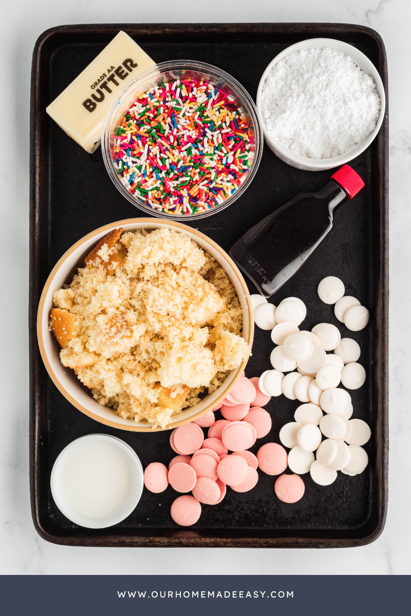 Cake pop ingredients on black tray