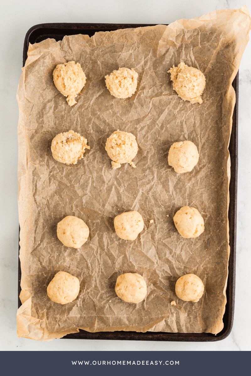 vanilla cake pops chilled on cookie sheet