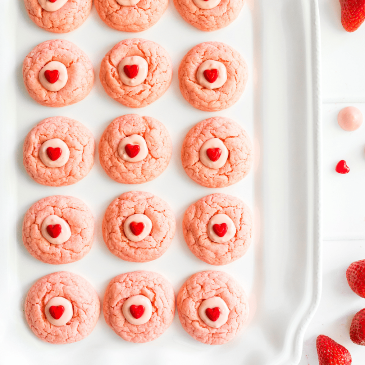 strawberry cake mix cookies lined up on serving tray