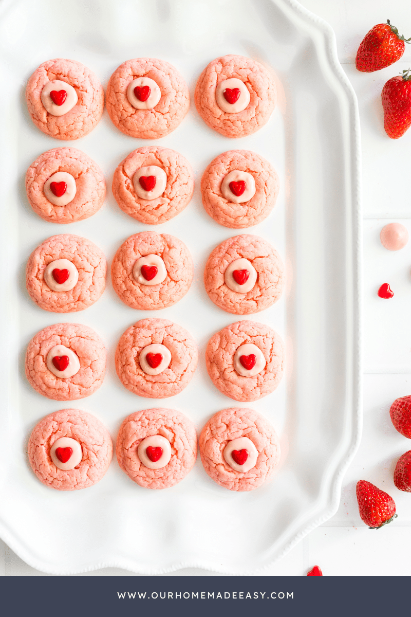 strawberry cake mix cookies lined up on serving tray