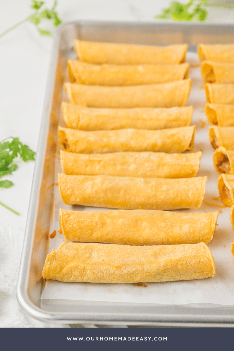 Finished taquitos on baking sheet