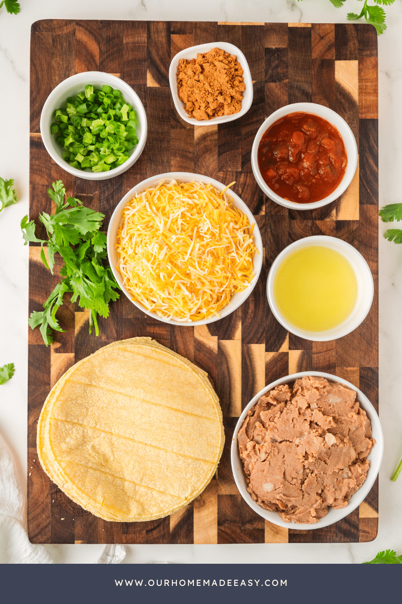 bean and cheese taquito ingredients lying on wood board