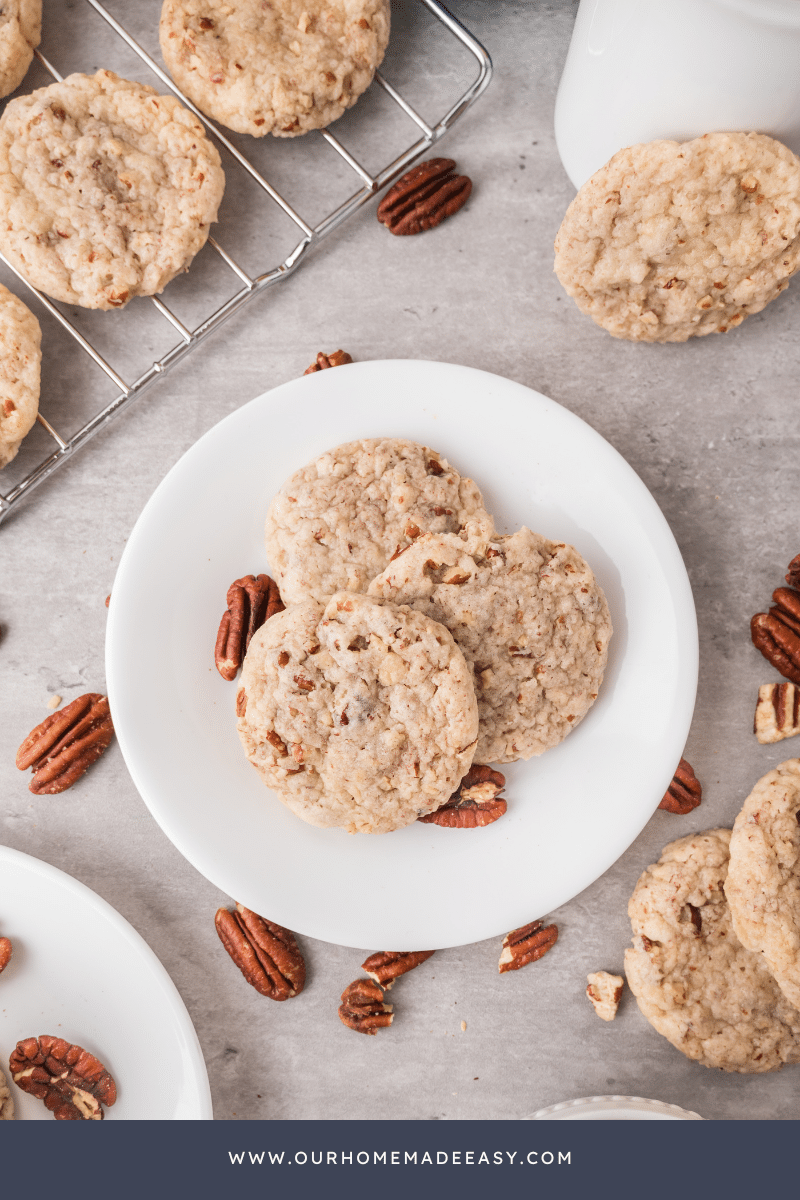 homemade pecan sandies on white plate