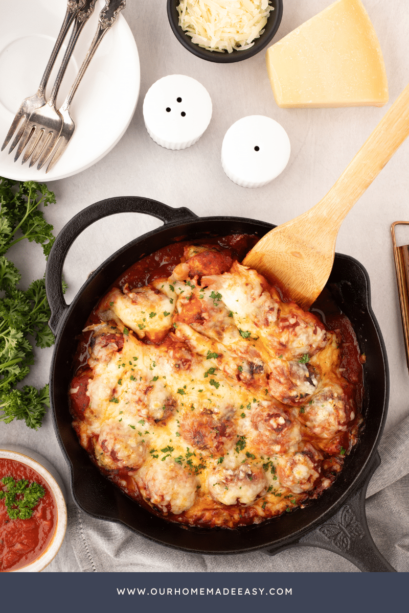 chicken parmesan meatballs in cast iron skillet