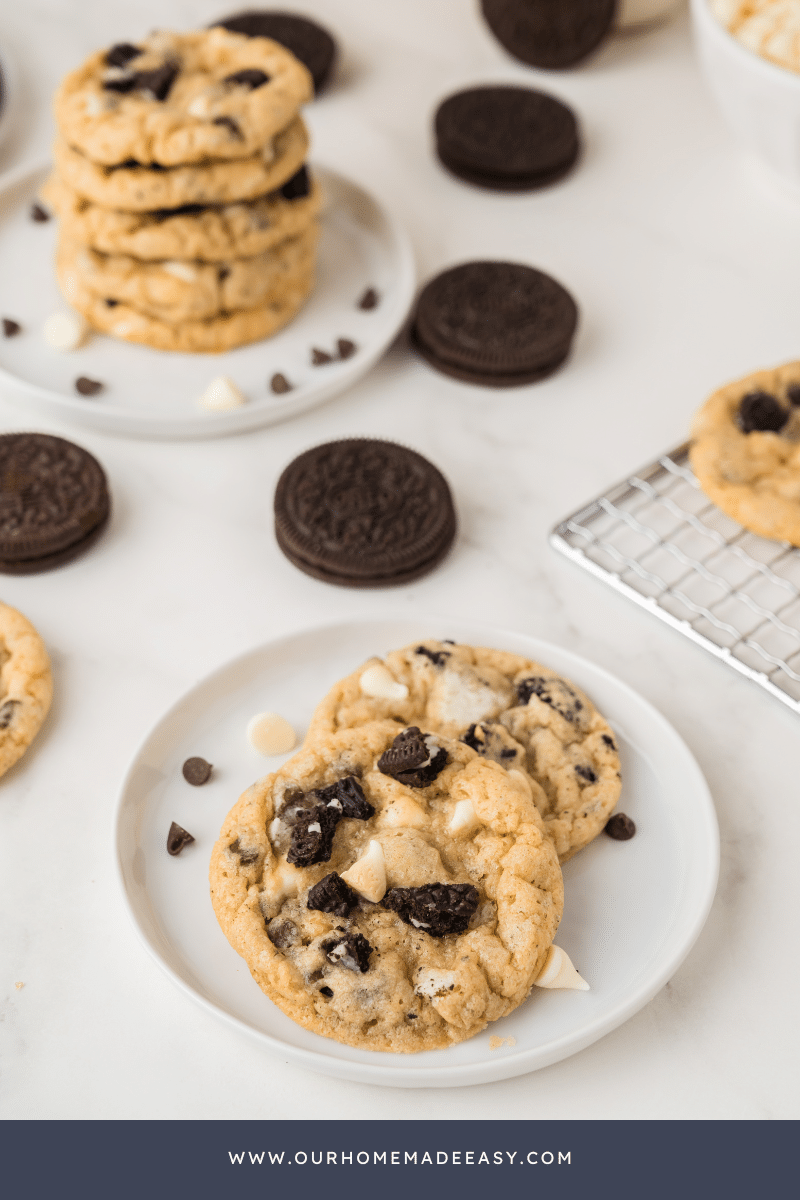 Cookies and Cream Cookies  on white plate with Oreos behind them