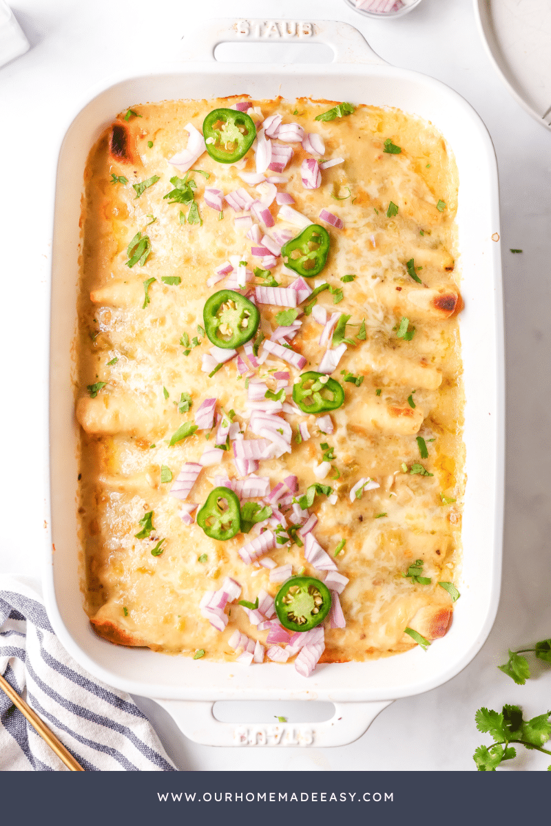 finished green chile enchiladas in casserole dish