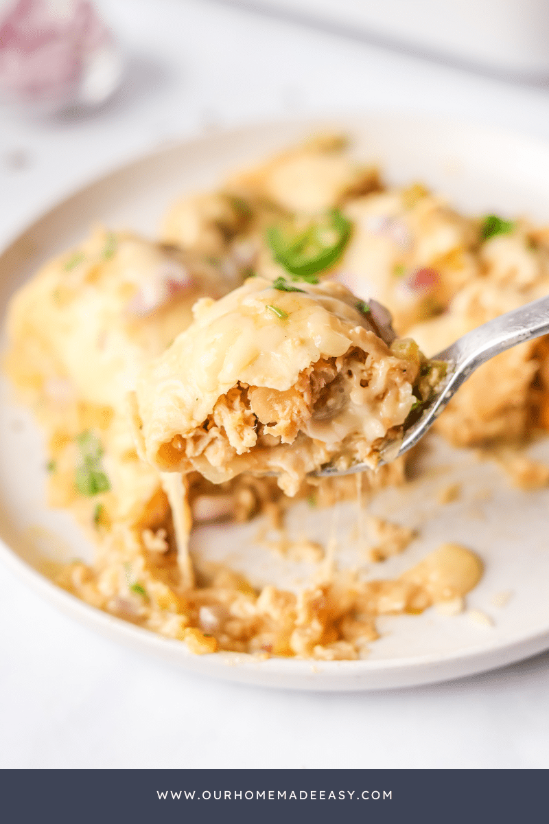 Mexican cheesy enchilada casserole on fork