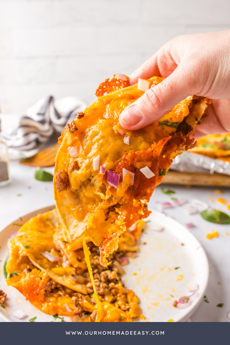 finished chicken sheet pan tacos with melty cheese pull